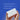 Hands holding a white ProDx at-home test kit box in front of a blue background with text about 48-hour results and telehealth